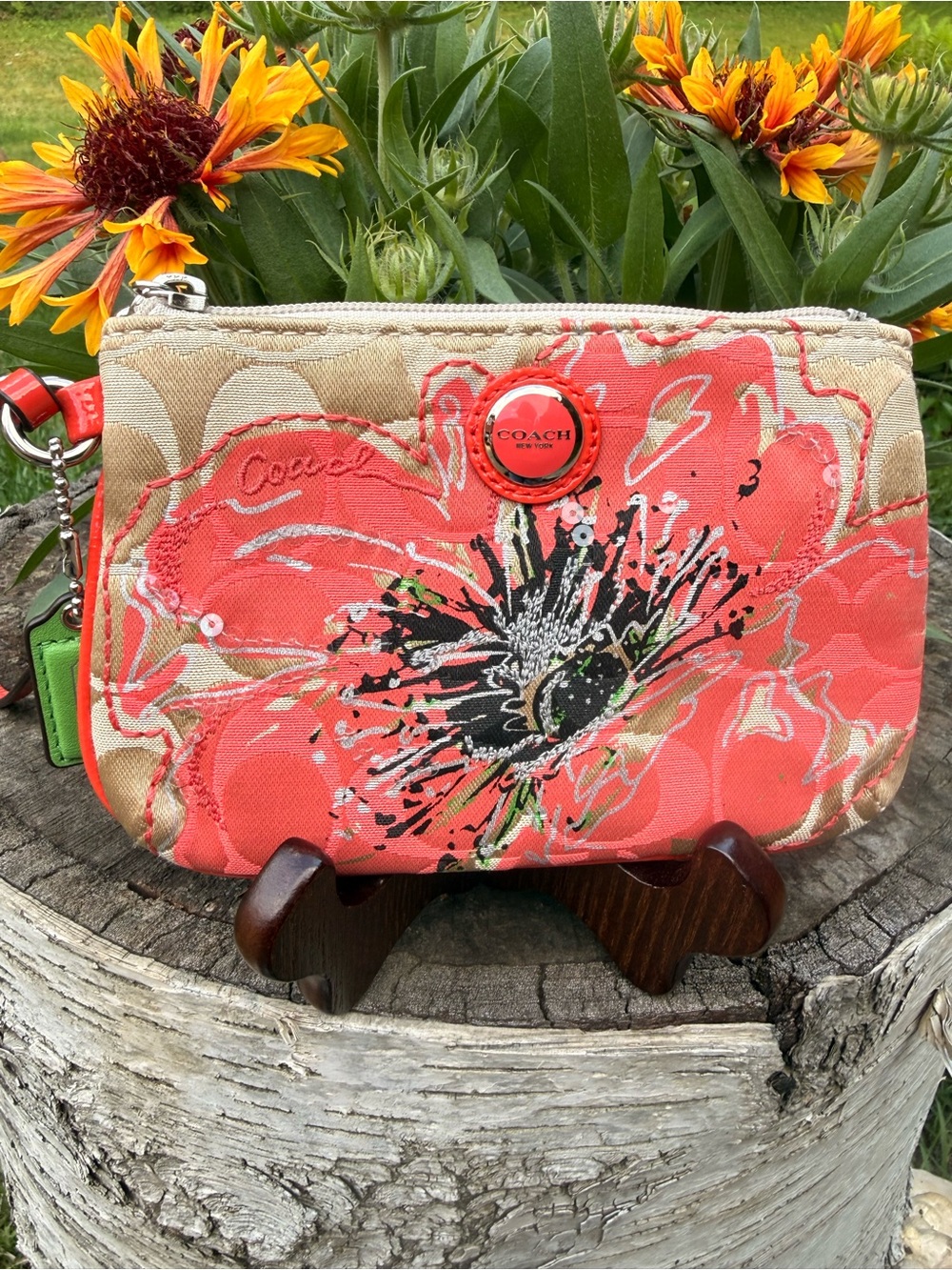 Coach Poppy flower embellished Wristlet